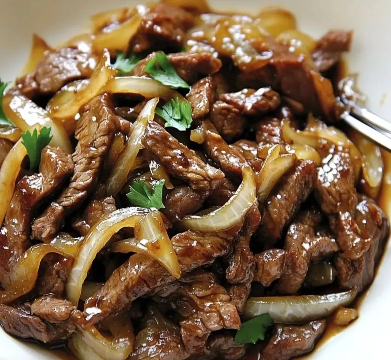 Bœuf aux oignons fondants