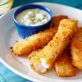 Filets dorés avec panko et garniture d'herbes frais.
